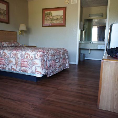 Executive Inn & Suites Orange Quarto foto
