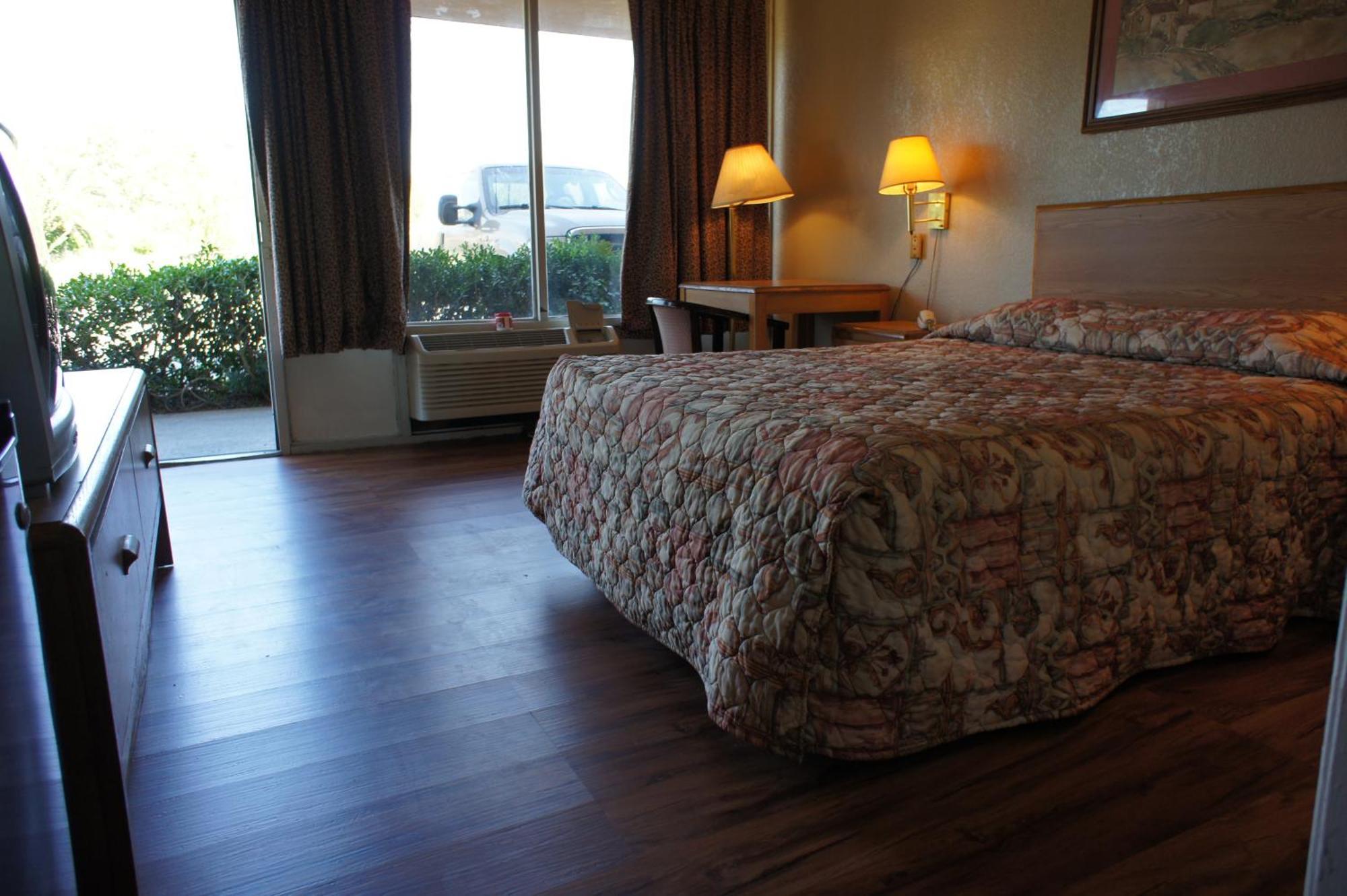Executive Inn & Suites Orange Quarto foto