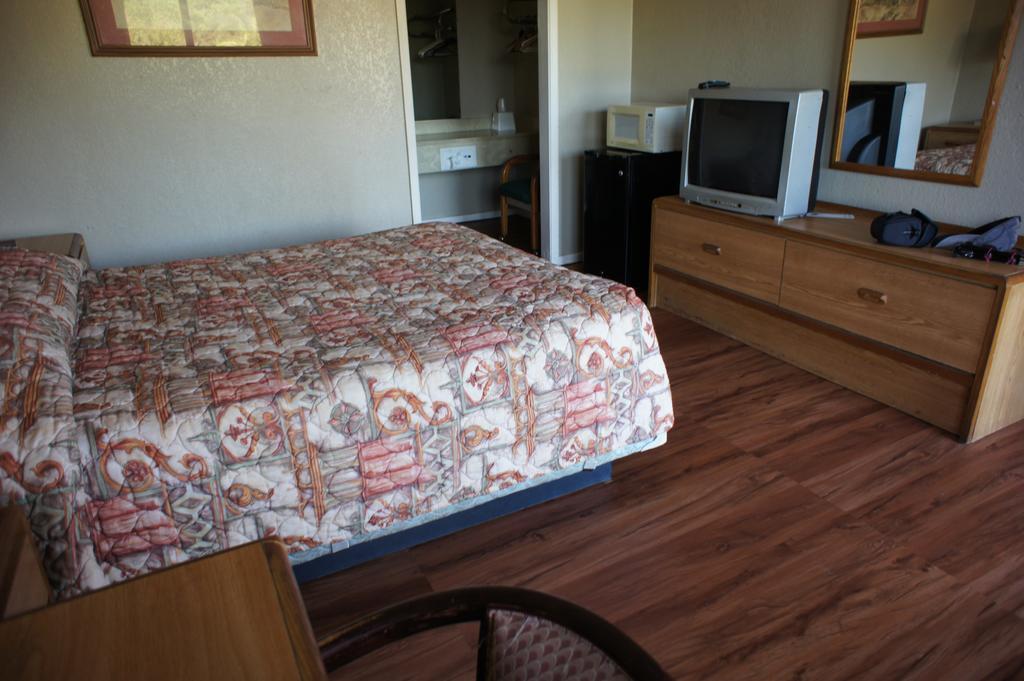 Executive Inn & Suites Orange Quarto foto